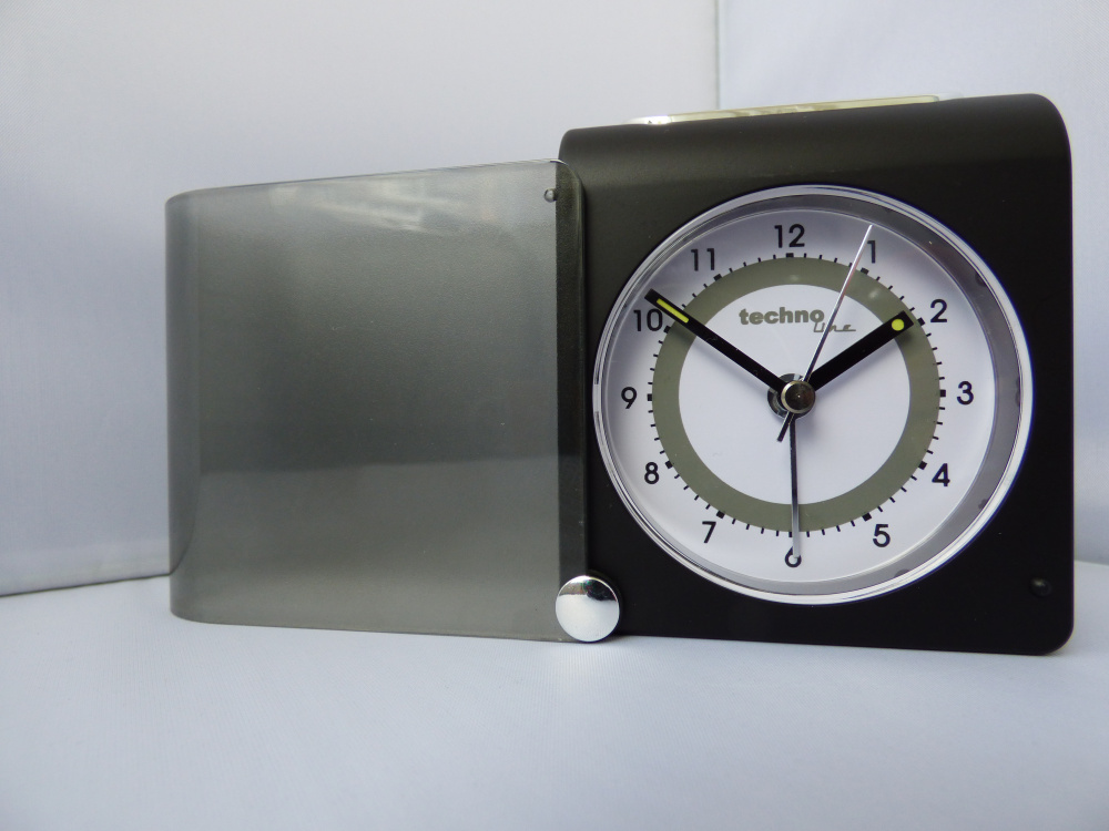 Reisewecker mit Schutzklappe