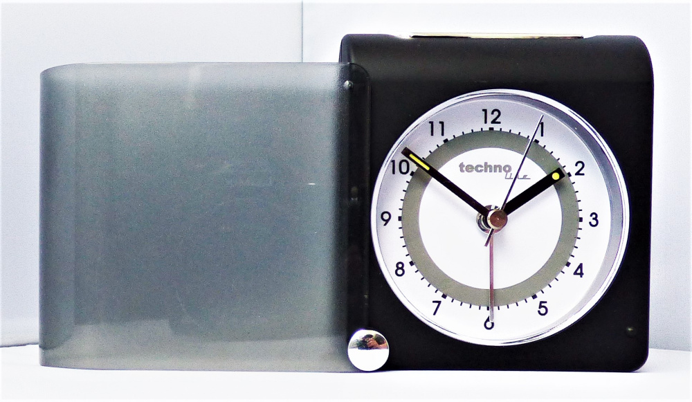 Reisewecker mit Schutzklappe