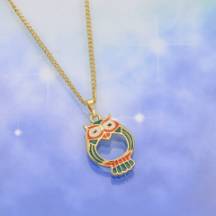 goldfarbige_kette_mit_anhaenger_eule_mit_lupe