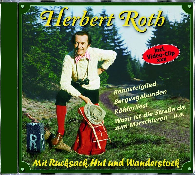 Mit Rucksack, Hut und Wanderstock